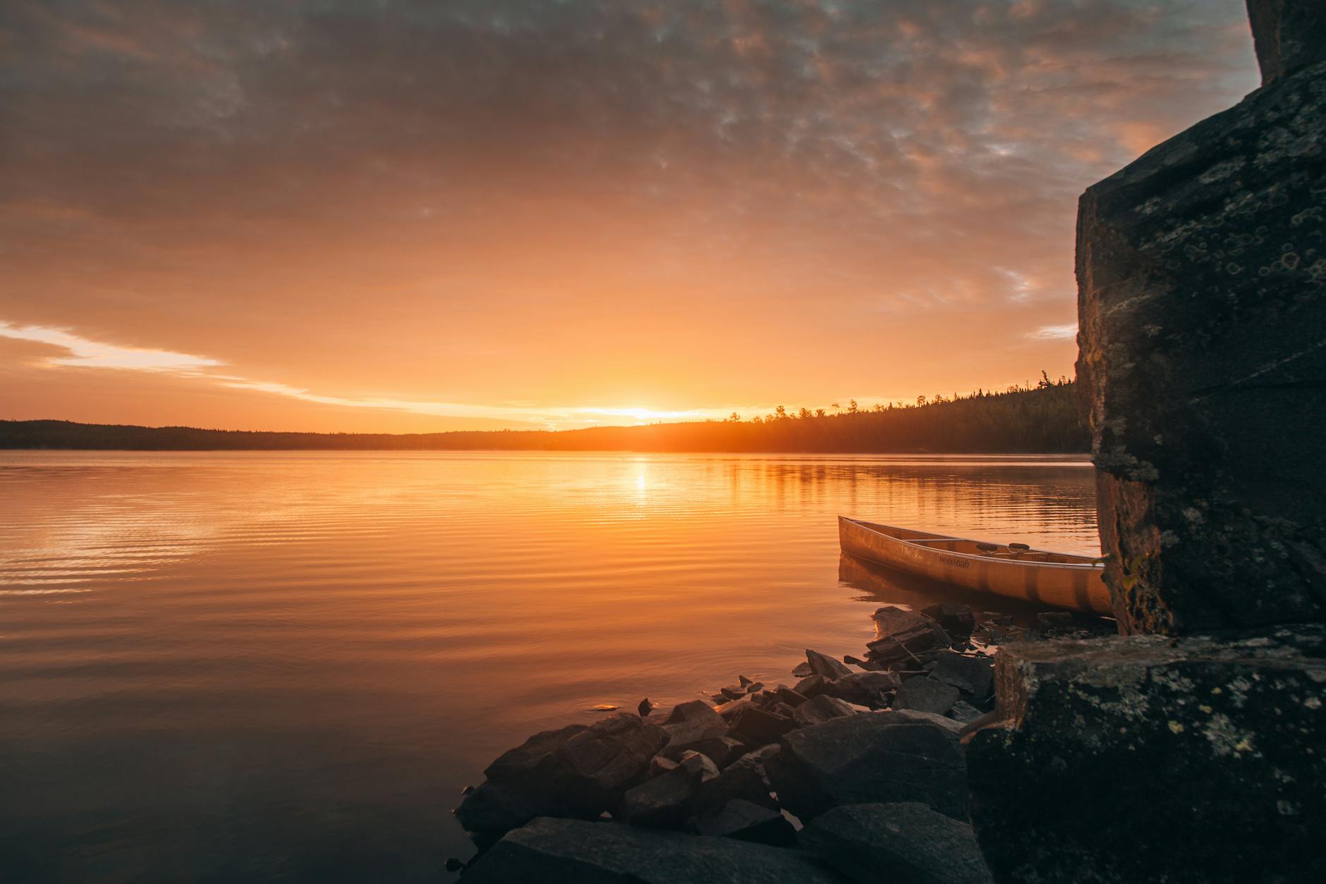Sunset over lake and dock