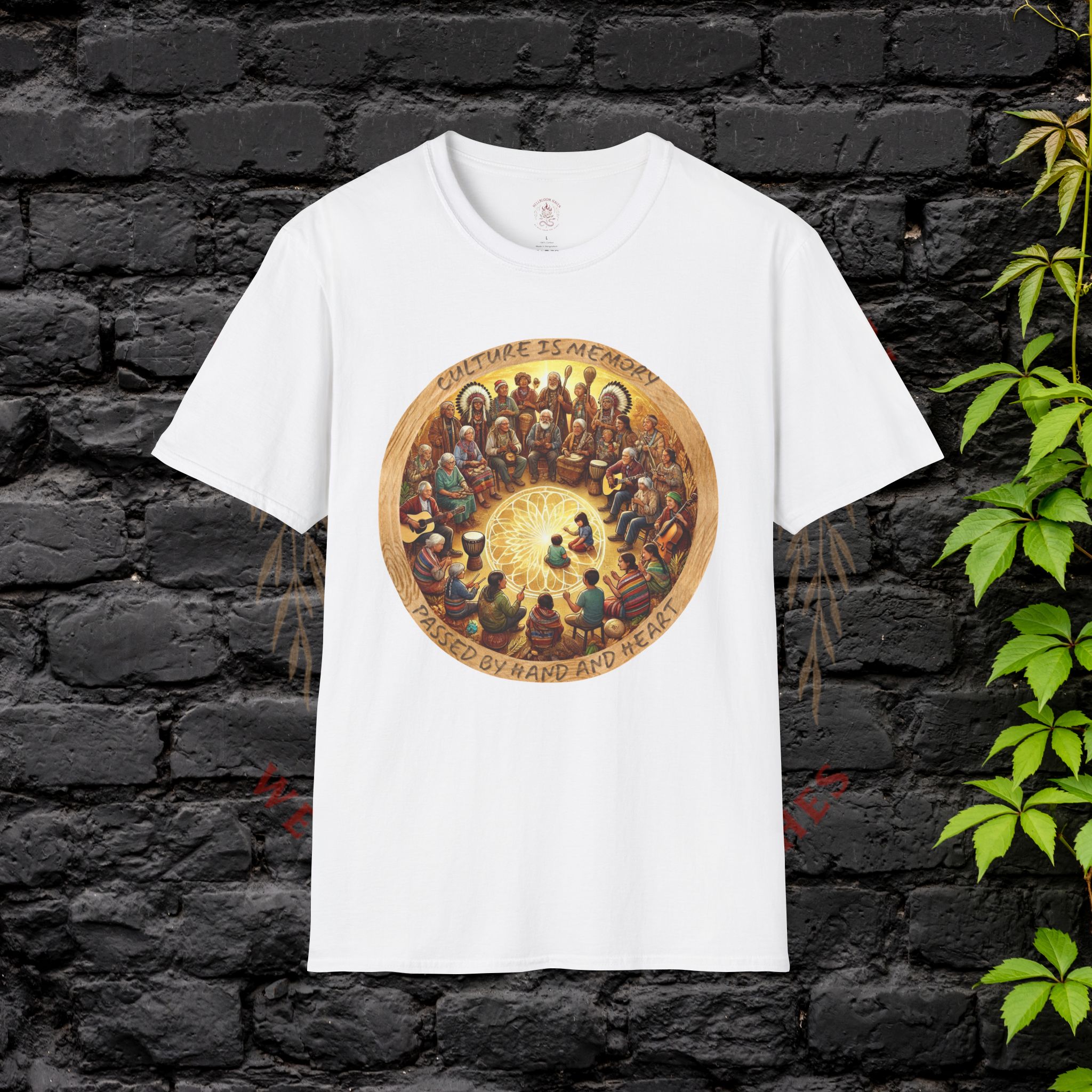 White t-shirt featuring circular artwork of people gathered together in unity with warm glowing tones